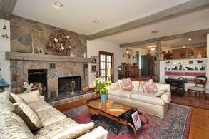 Familyroom with Pioneer Inspired Fireplace - Country homes for sale and luxury real estate including horse farms and property in the Caledon and King City areas near Toronto